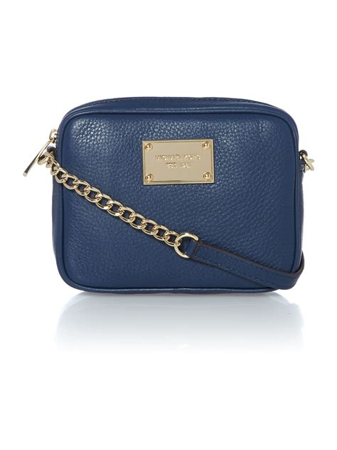 navy blue designer crossbody bag.